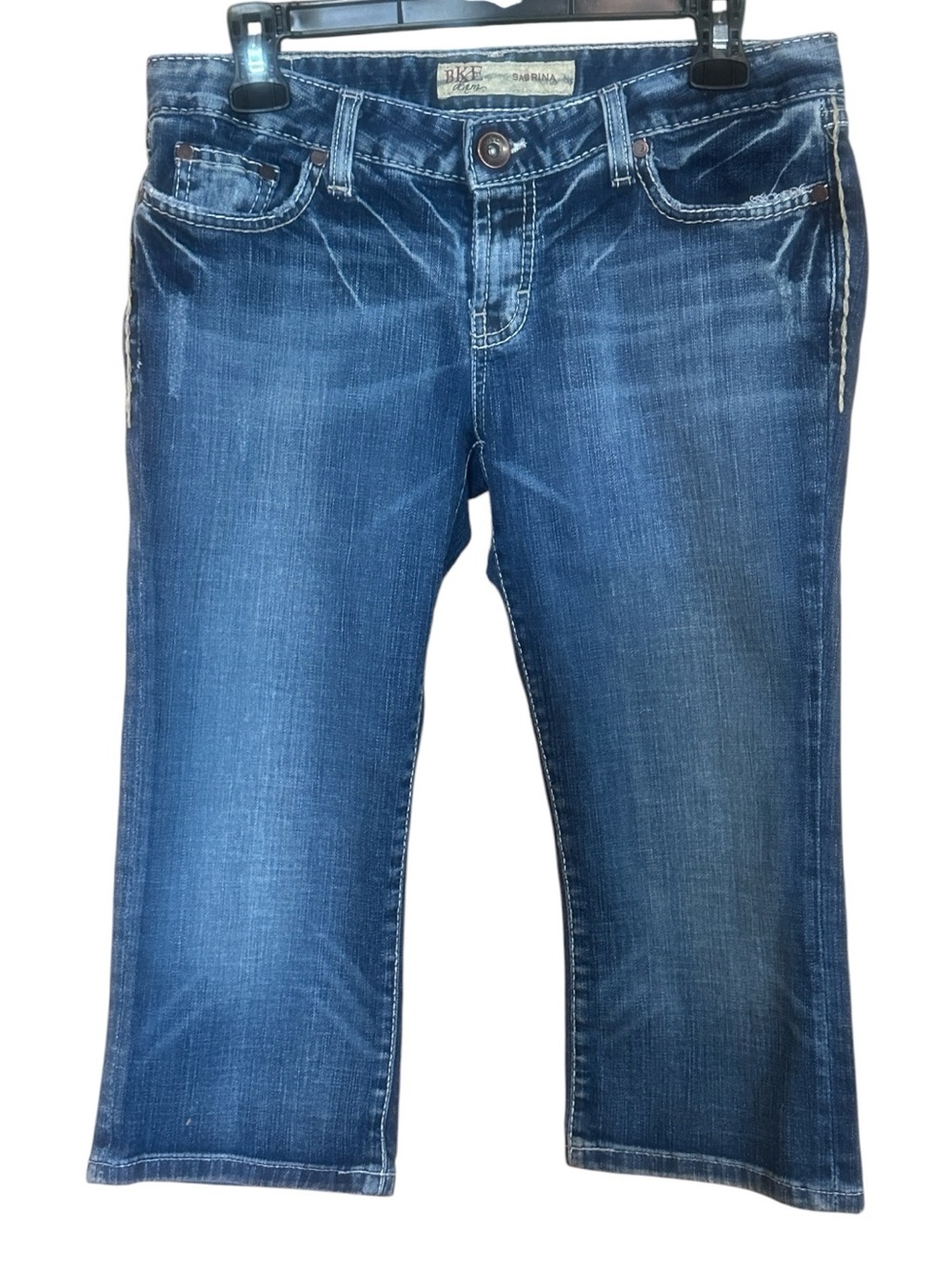 BKE Women’s Blue Light Distressed Sabrina Cropped Jeans. Mid Rise